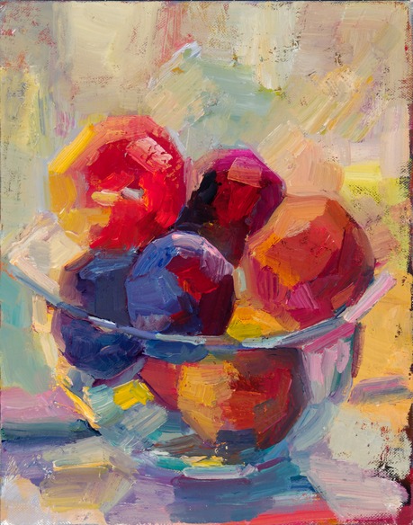 A bowl of plums and peaches